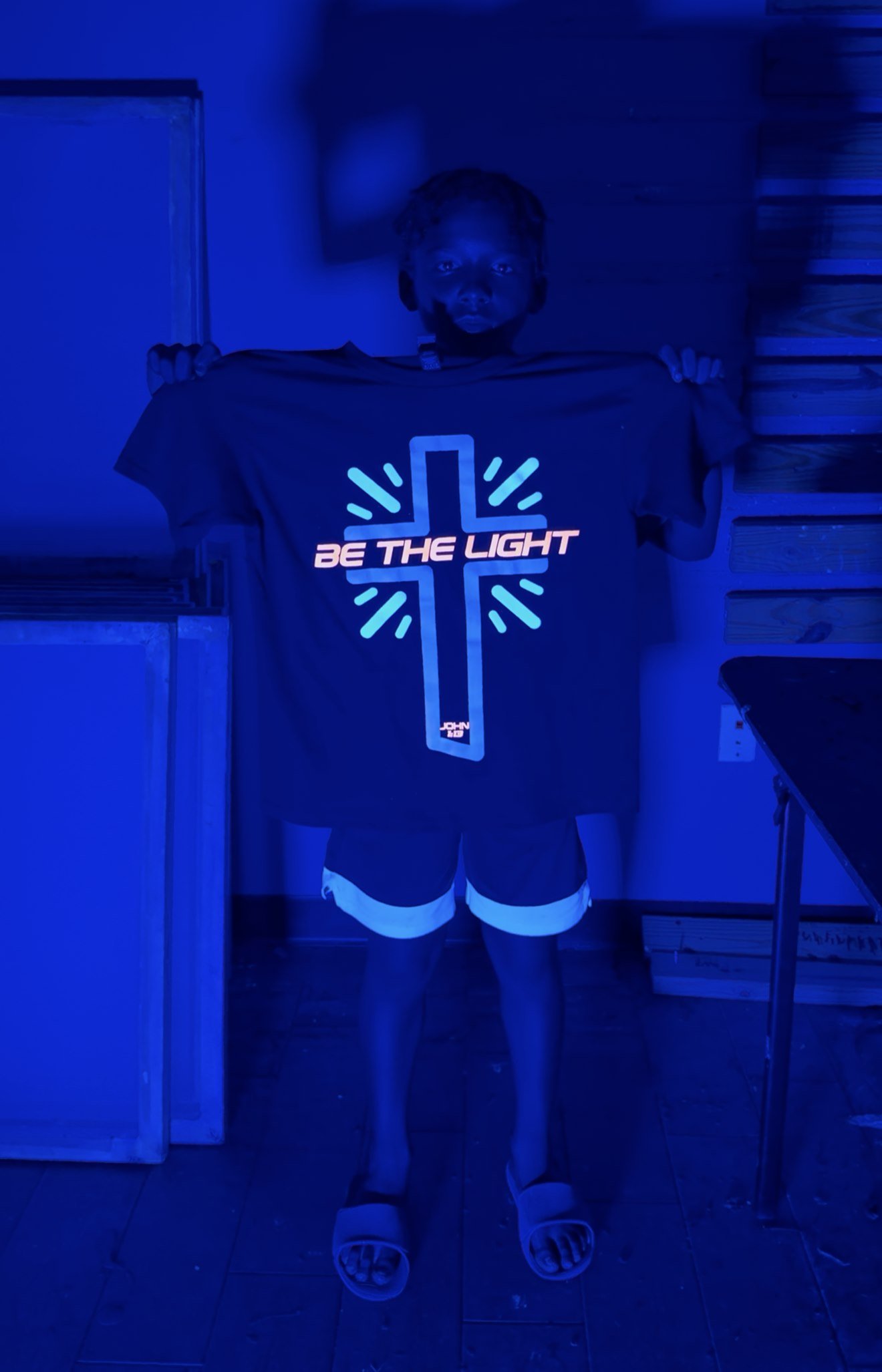 Glow-in-the-dark screen print illuminated under UV light